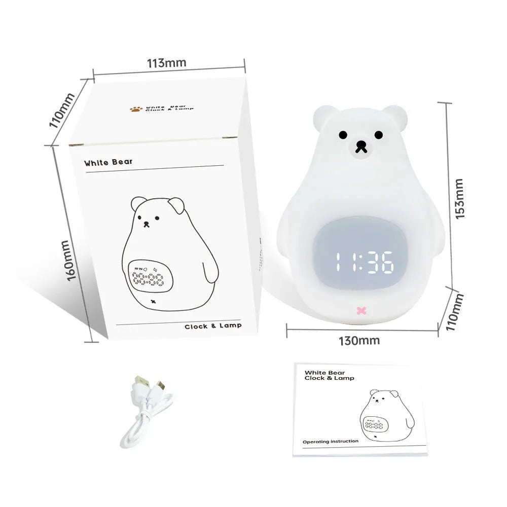 Big white bear shaped silicone night light with remote control on a table.