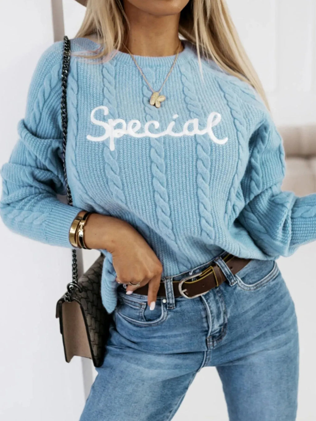 Blue leisure pullover with embroidered letters on crew neck in street fashion style