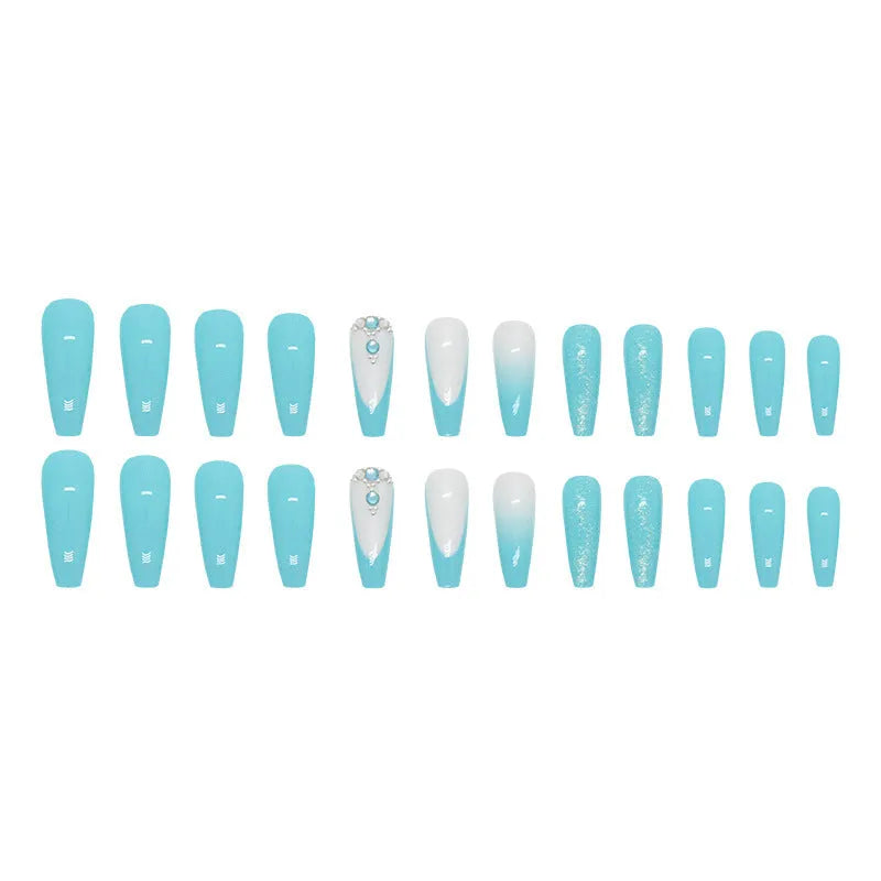 Solid blue long ballet shaped false nail art patches with a bottle of adhesive glue on a white background.