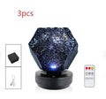 LED star projector night light showing constellation projection on bedroom ceiling with remote control