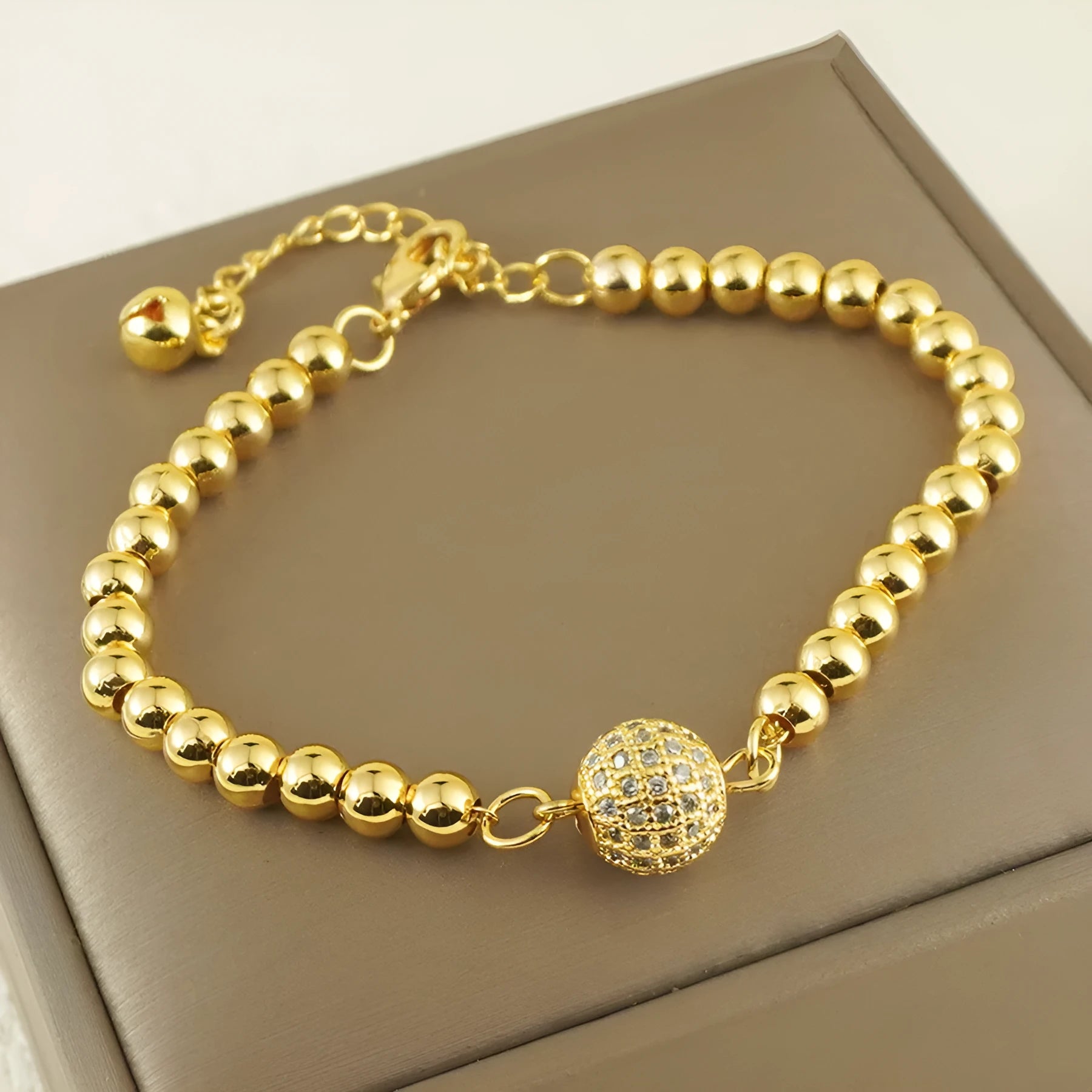 Arabic-style women's copper bracelet with heart-shaped links and single zircon stone decoration