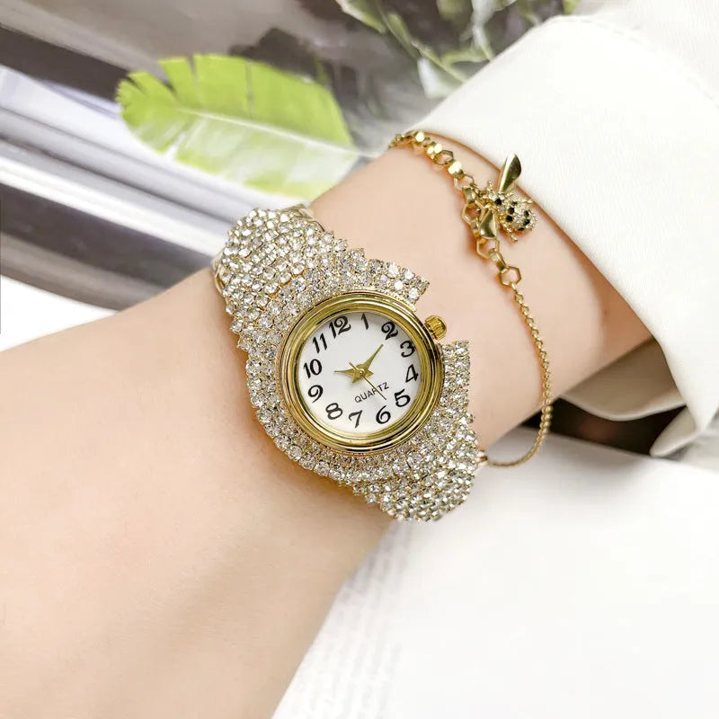 Women's 33mm quartz watch with circular dial, metal case, alloy strap, and open buckle