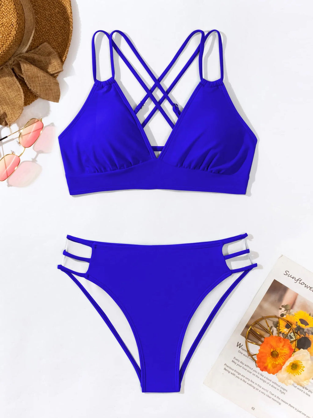 Ladies' black V-neck halter bikini swimsuit with adjustable ties and matching briefs.