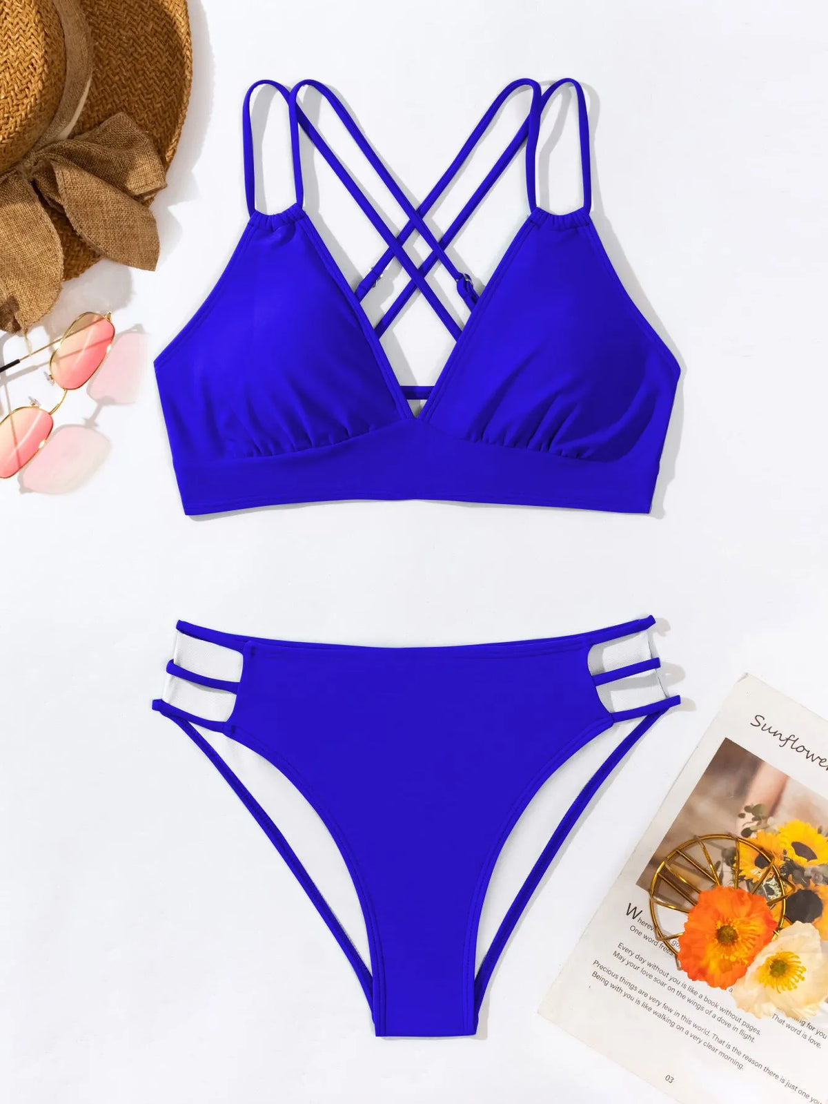 Ladies' black V-neck halter bikini swimsuit with adjustable ties and matching briefs.