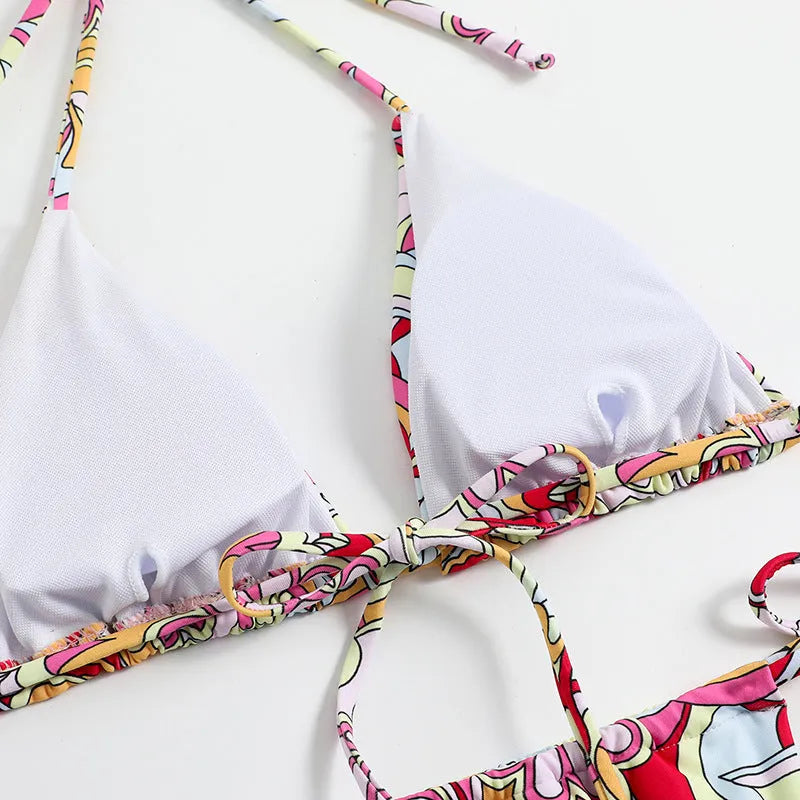 Women's triangle printed bikini set with halter neck top and separate bottom in multicolor pattern