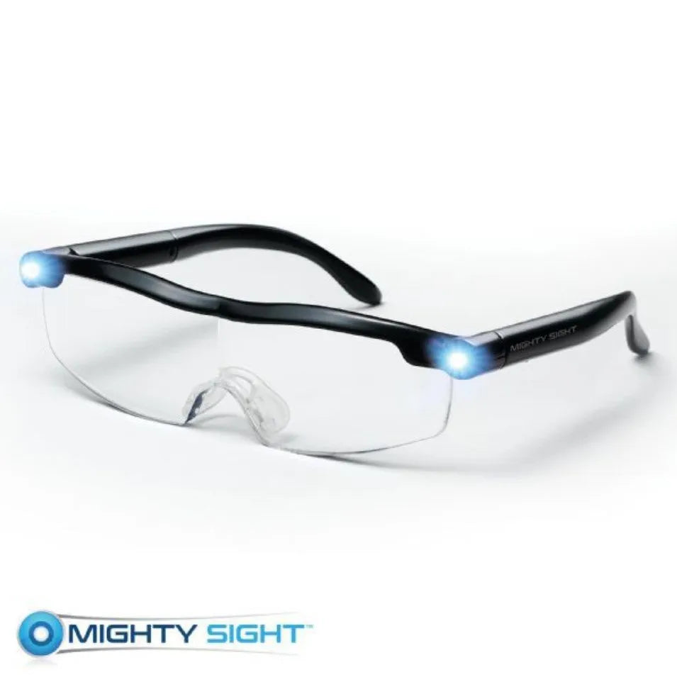 Transparent black USB LED reading glasses with integrated light on the frame.