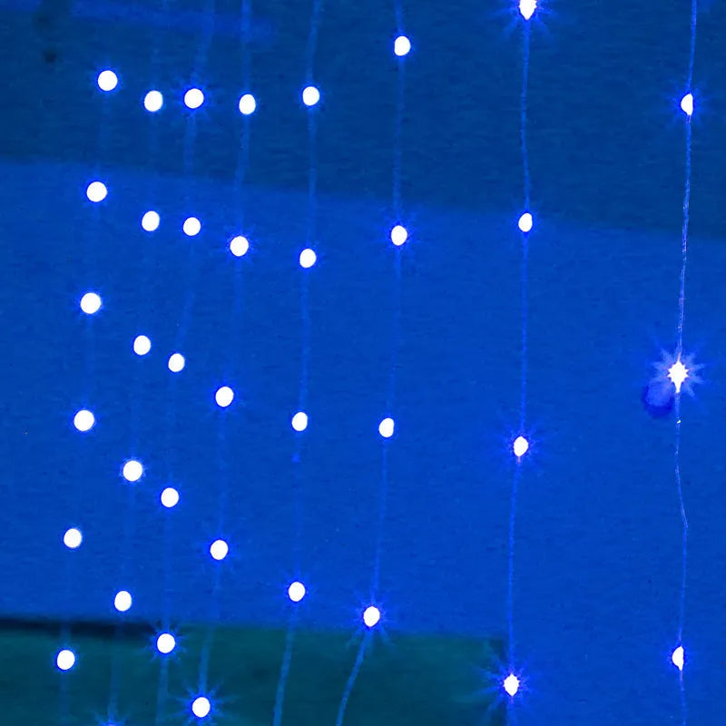 Copper curtain Christmas lights with LED beads in blue colour, showing romantic star lights effect for holiday decoration