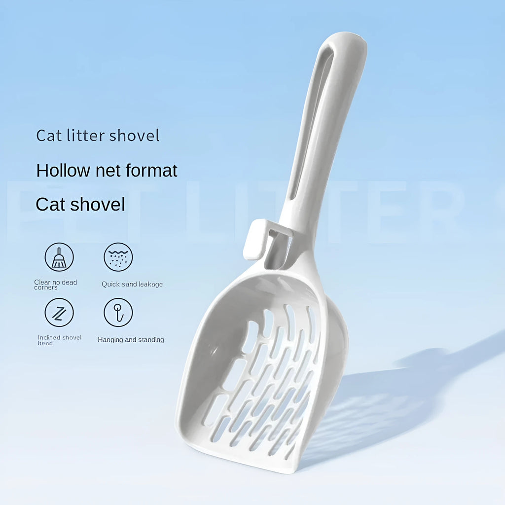 Grey plastic cat litter scoop with drainage holes resting on matching base unit