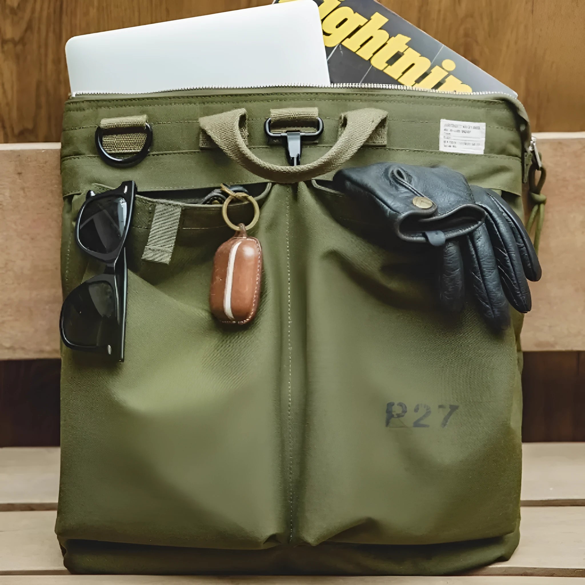 Canvas messenger bag with retro style, shoulder strap, and open showing 15-inch laptop compartment