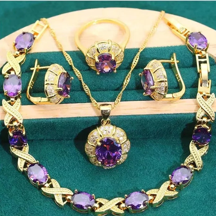 18k gold plated jewellery set with multi-colour cubic zirconia stones including necklace, earrings, ring, and bracelet