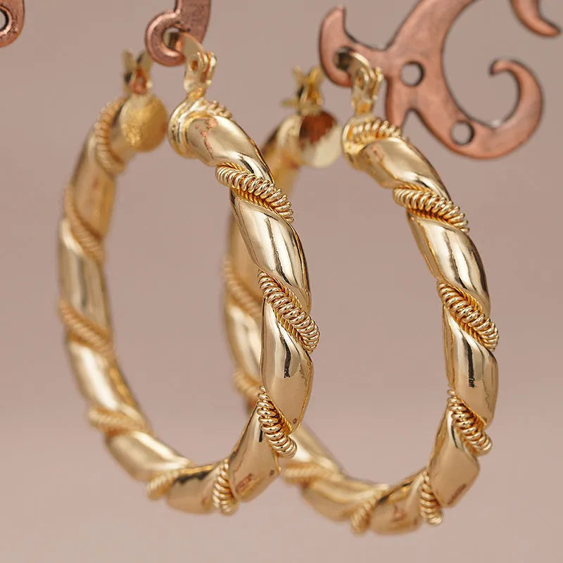 Geometric copper women's earrings with ring ear clip design in golden colour