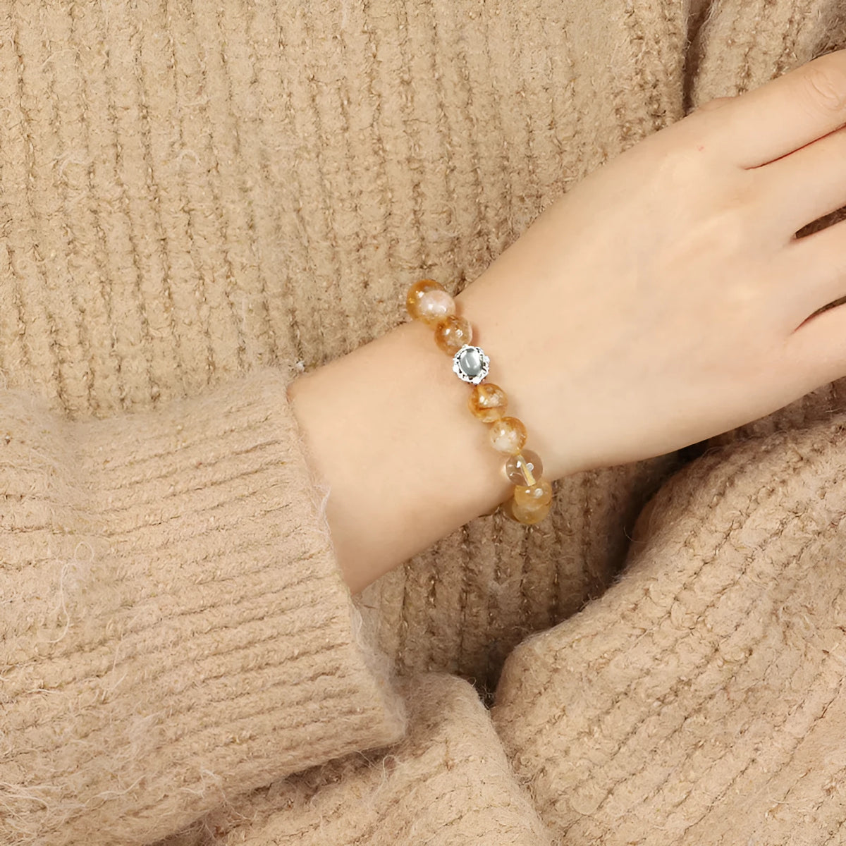 Citrine crystal bracelet with 10mm geometric beads showing grinding treatment details