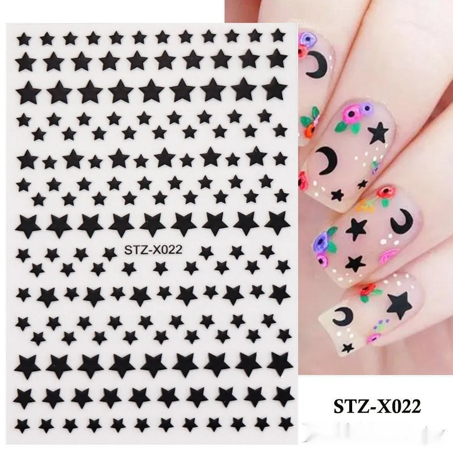 Cartoon love pattern nail art sticker decals in black and silver colours on a plastic sheet.