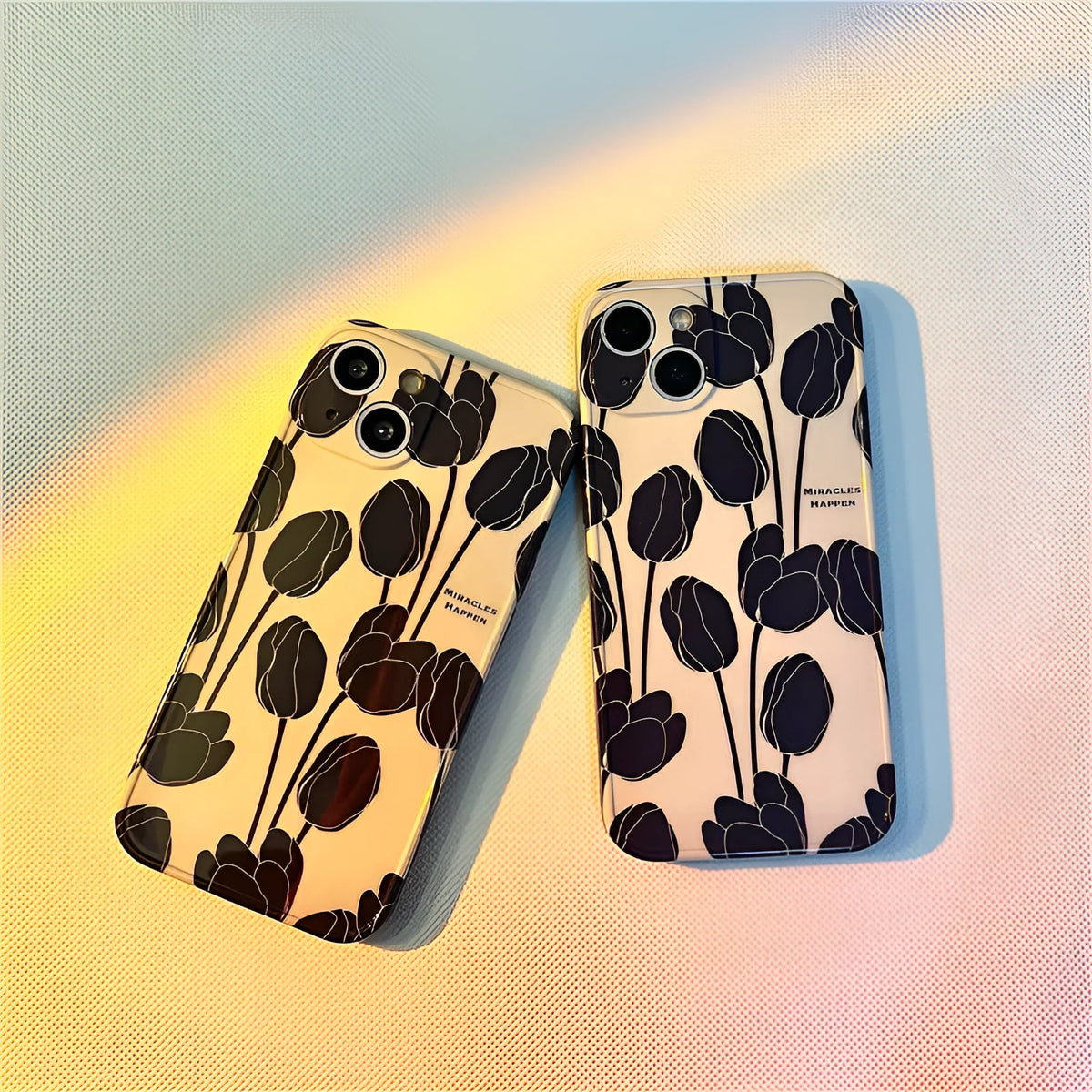 Black silicone iPhone case with tulip design for iPhone 13, 12, 11, X, and 7/8 Plus models