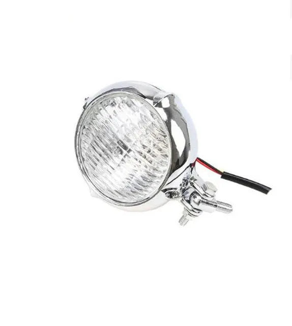Black electroplated aluminium motorcycle headlight with halogen bulb for classic custom bike builds.