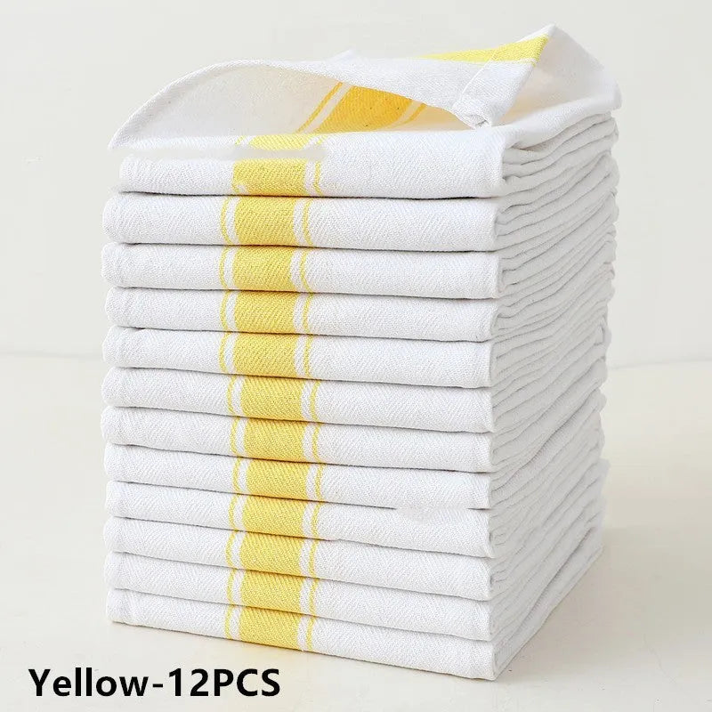 Set of 12 striped cotton dish towels in mixed colours including black, blue, brown, yellow on a kitchen surface