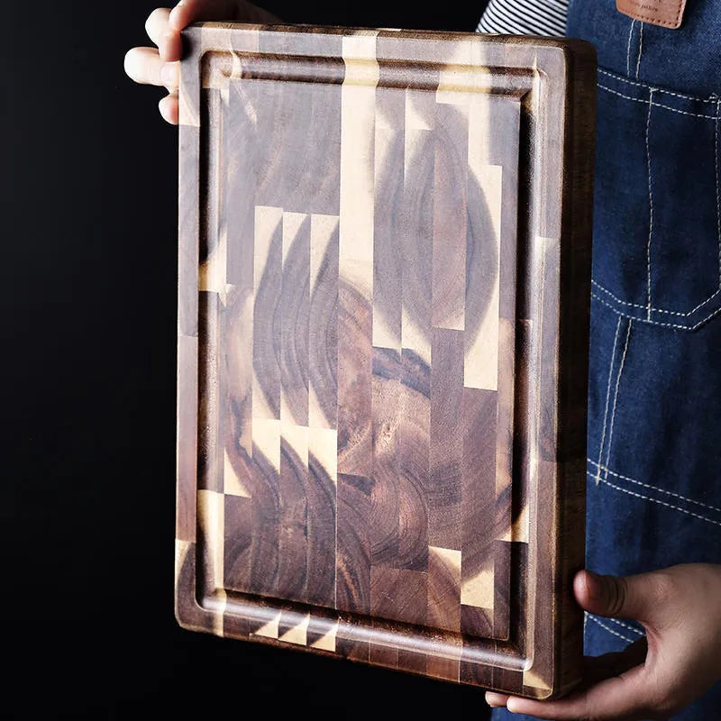 Brown solid acacia wood chopping board, 3cm thick, on a kitchen countertop.