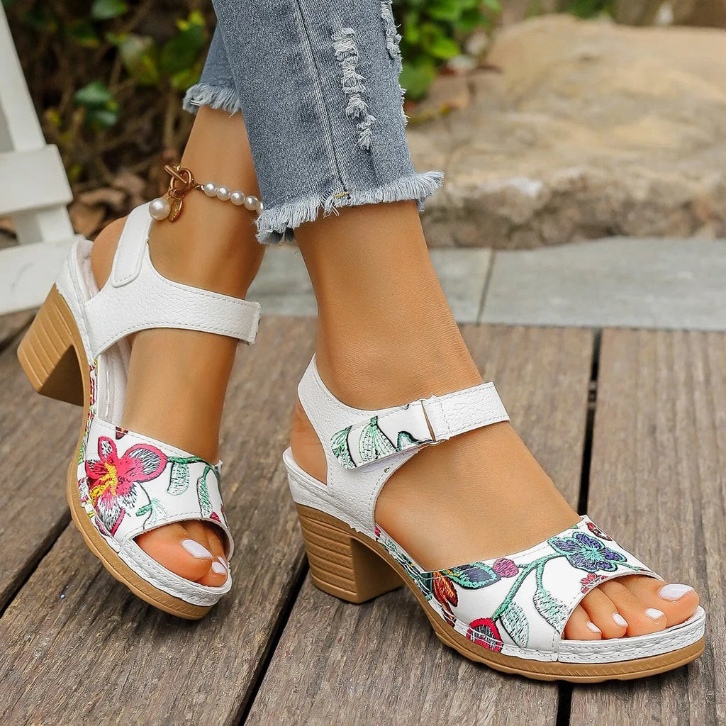 White women's high heel sandals with adjustable Velcro buckle fastening and rubber sole