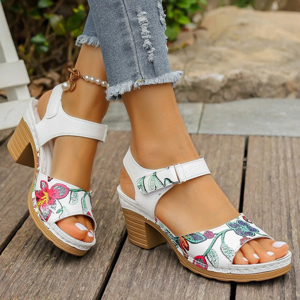 White women's high heel sandals with adjustable Velcro buckle fastening and rubber sole