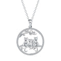 Women's copper necklace with an electroplated pendant showing four kittens on a cross chain.