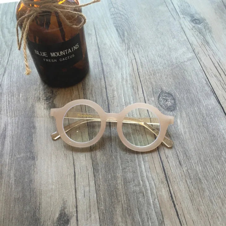 Retro round frame glasses in six colour variations with PC frame and UV400 protection