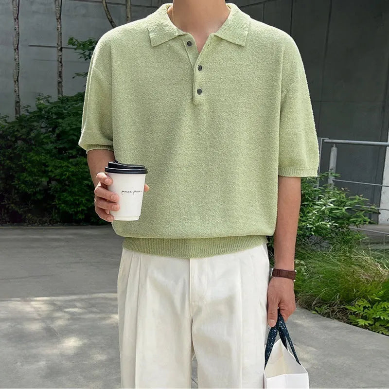 Men's caramel coloured retro asymmetric knitted polo shirt on a hanger, loose fit short sleeve.