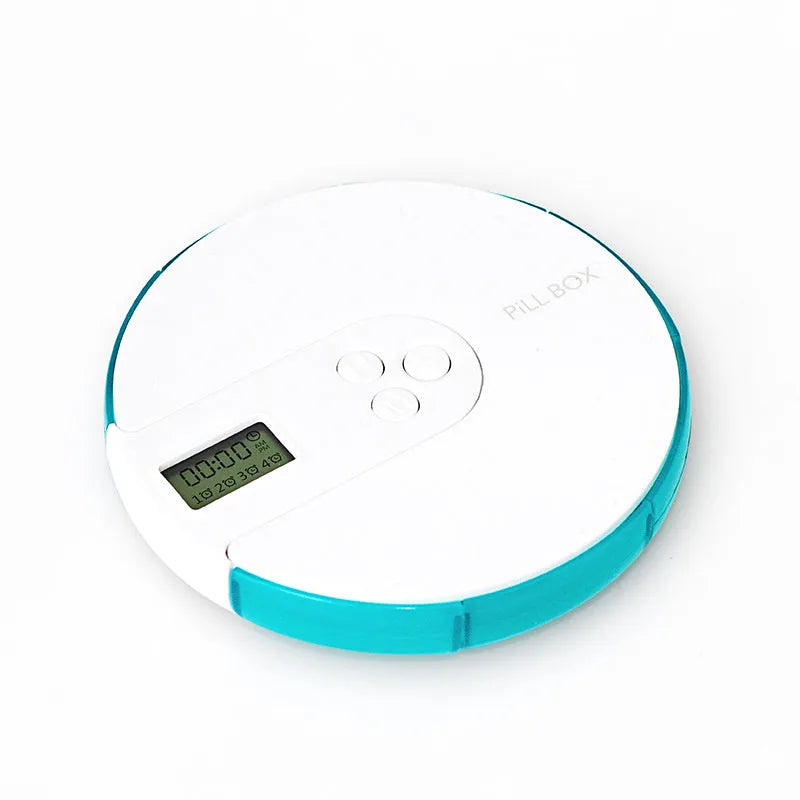 Blue 7-compartment alarm clock pill dispenser showing timer display and weekly medicine slots