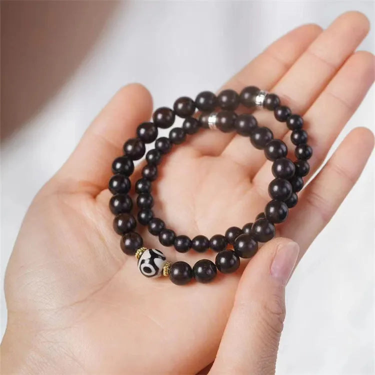Ebony Tibetan bead bracelet with two circles of 8mm dark wood beads