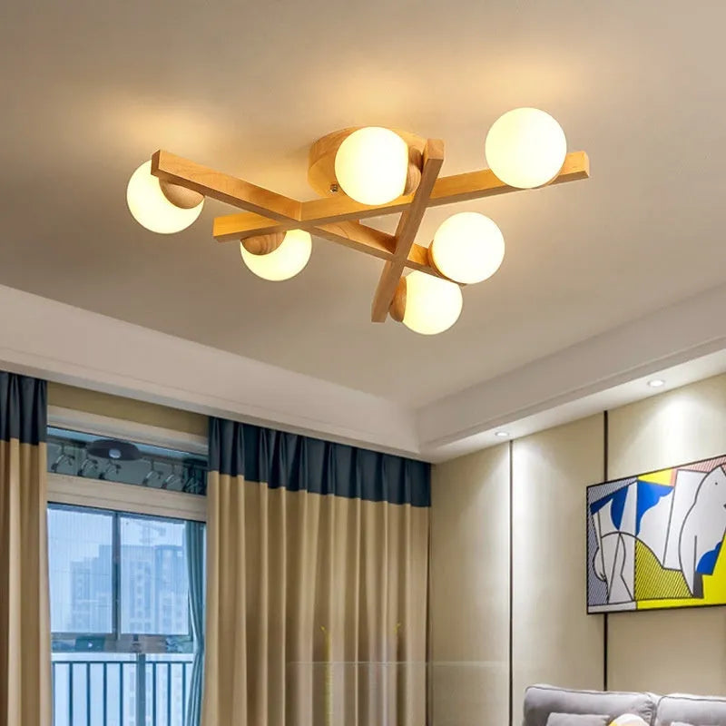 Wooden style living room ceiling light with three adjustable heads in Nordic modern design