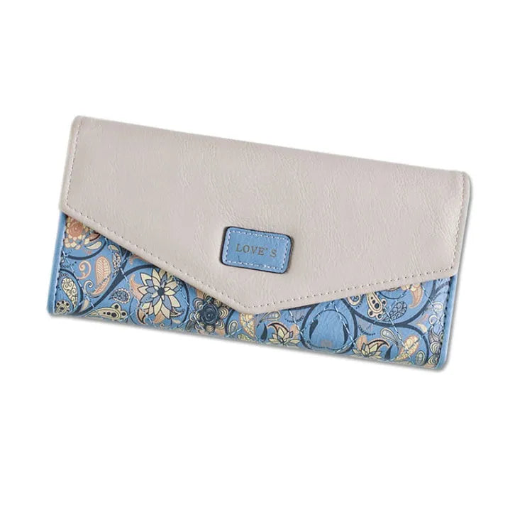 Three-fold women's leather wallet with buckle clip closure in five colour options showing dimensions