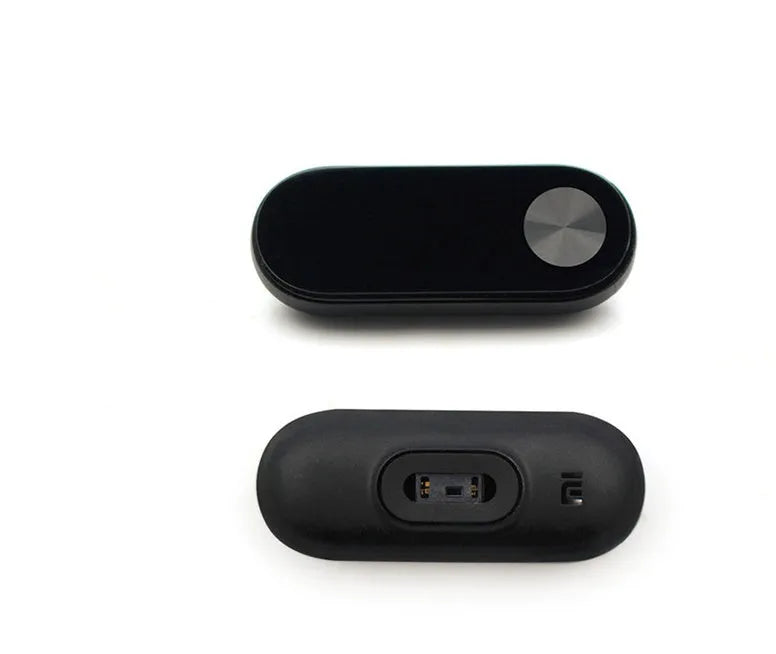 Black Xiaomi Mi Band 2 fitness tracker with OLED screen on an adjustable thermoplastic wrist strap.