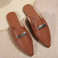Light brown women's pointed toe low heel semi-slippers with a PU upper and rubber sole.