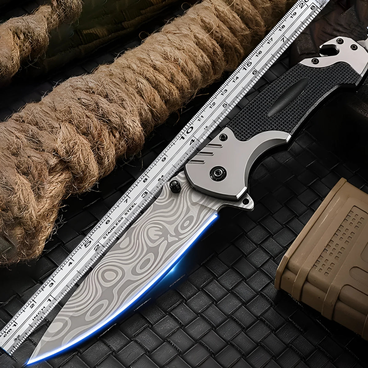 Outdoor folding knife with alloy blade showing textured handle option and folded position