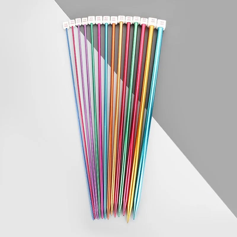 Lengthened crochet hook set showing multiple sizes with protective caps on ergonomic handles