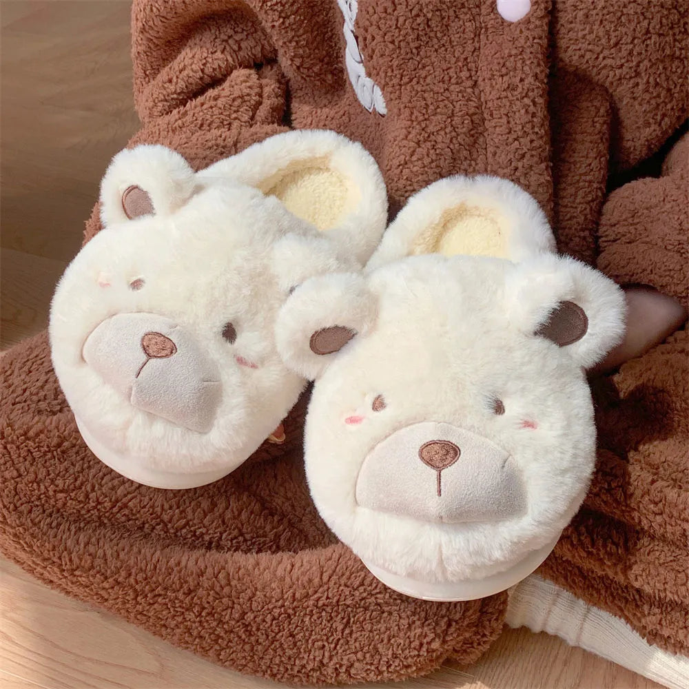 Women's cartoon patterned brown suede Baotou plush slippers with round toe.