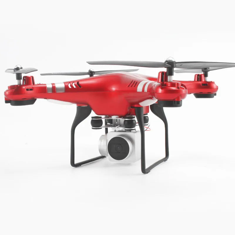 Black HD aerial photography drone with remote control handle on a table