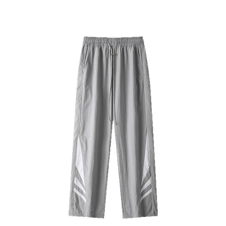 Men's straight-leg casual trousers in grey, showing elastic waistband and thin summer fabric.
