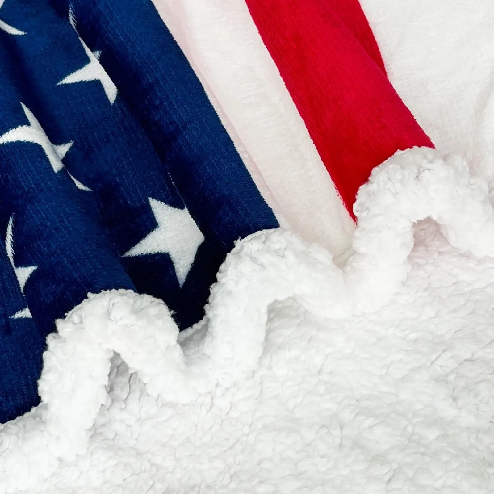 Striped polyester lambswool blanket in American style, shown in vacuum packaging.