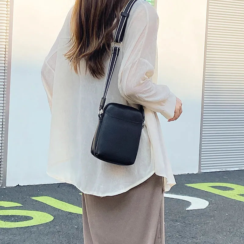 Solid colour small crossbody shoulder bag for women with adjustable strap