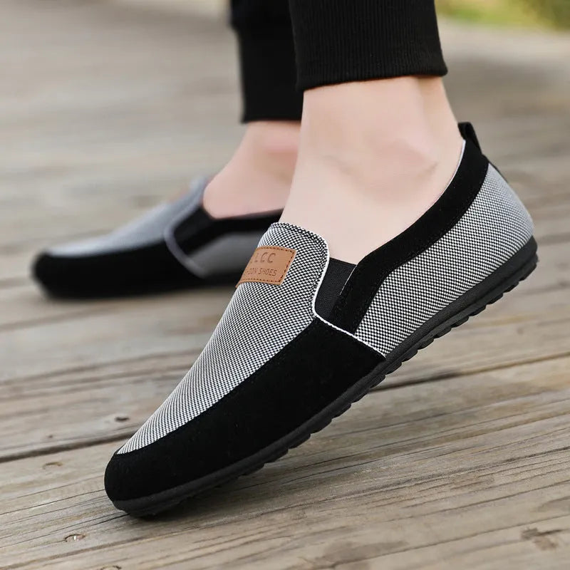 Men's grey canvas board shoes with round toe and rubber soles