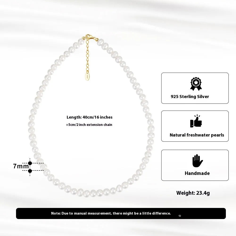 Close-up of a women's adjustable silver necklace with a single 6-7mm natural freshwater pearl pendant.