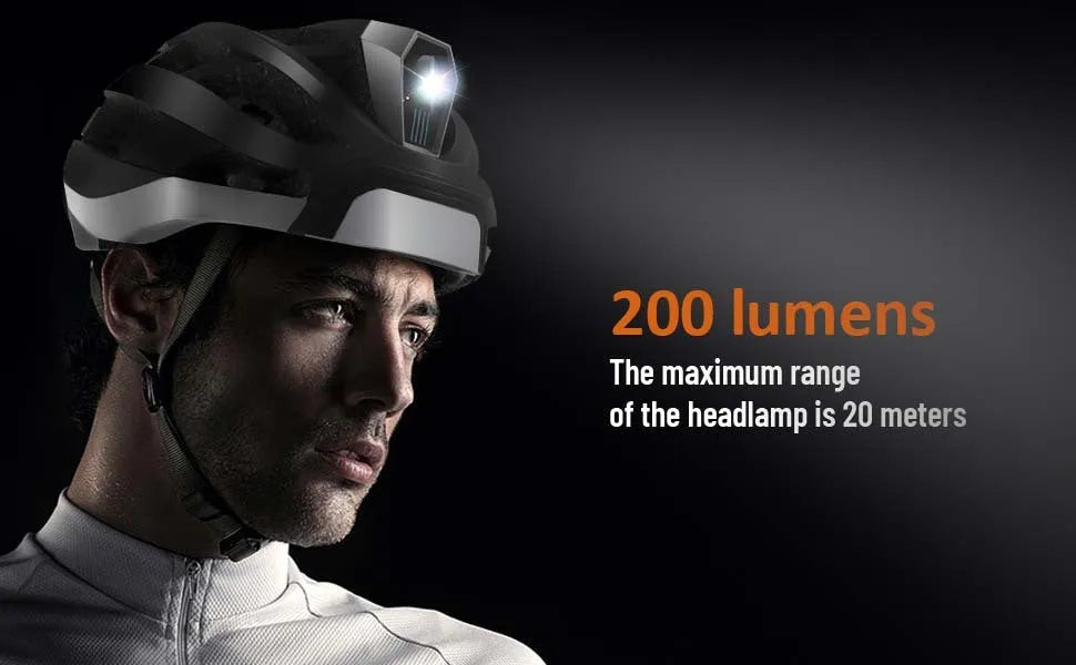Black and grey smart cycling helmet with integrated warning lights showing USB charging port