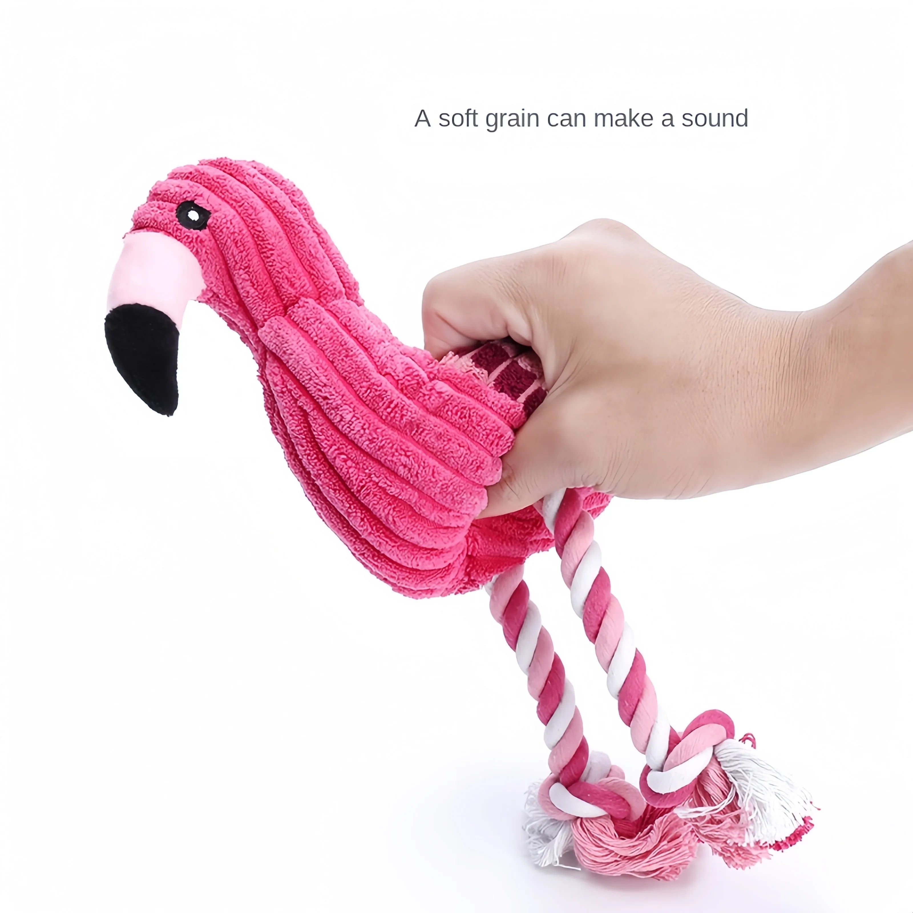 Pink animal-shaped corduroy dog toy with a squeaker inside on a white background.