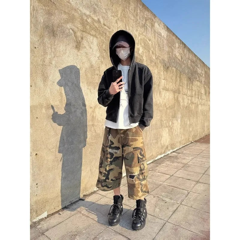 Men's camouflage cropped jeans with ripped detailing and loose straight leg fit