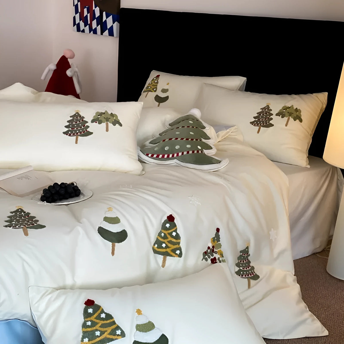 Cream Blue cotton duvet cover with embroidered Christmas tree and flower design, part of a four-piece bedding set.