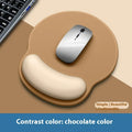 Silicone mouse mat with attached wristband in gradient colour pattern on desk