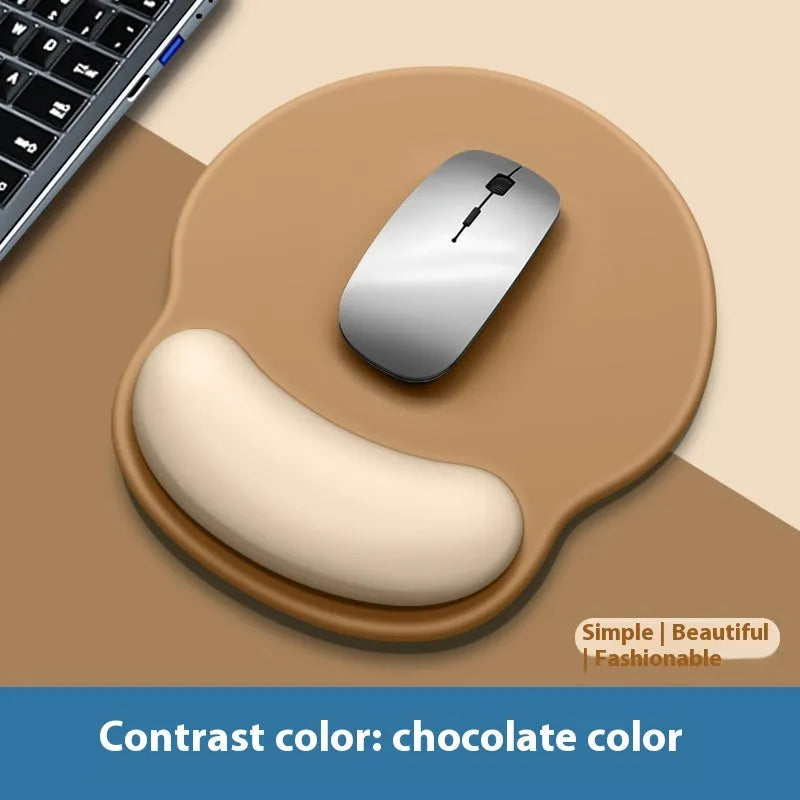 Silicone mouse mat with attached wristband in gradient colour pattern on desk