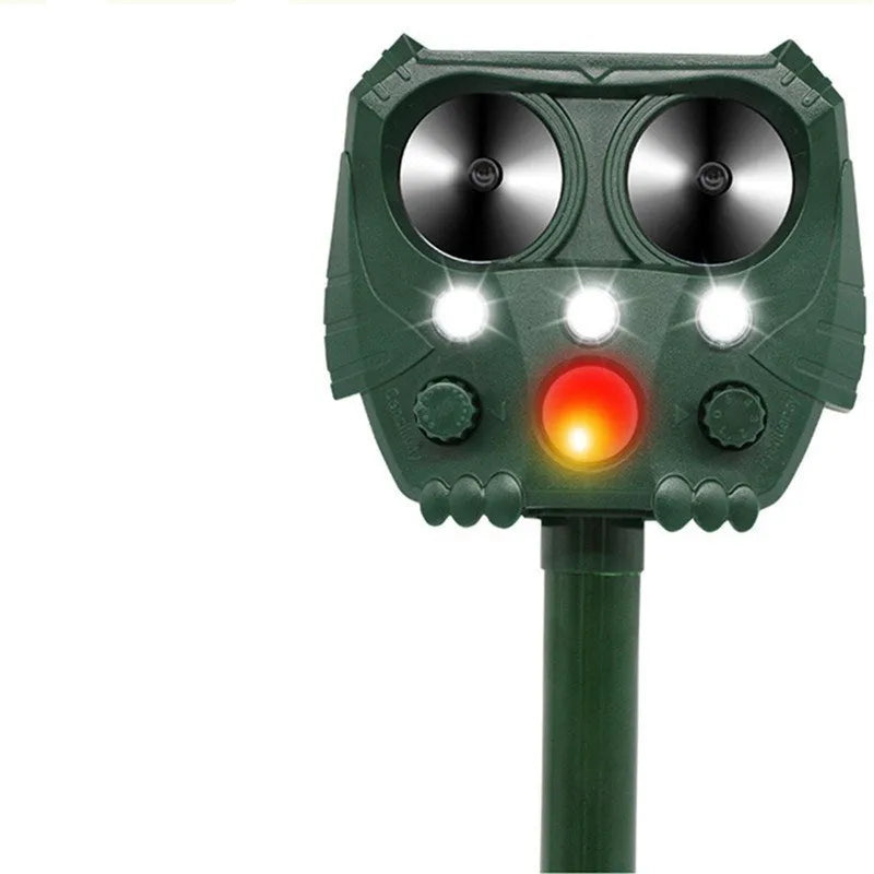 Green solar-powered ultrasonic animal repeller unit for outdoor pest control