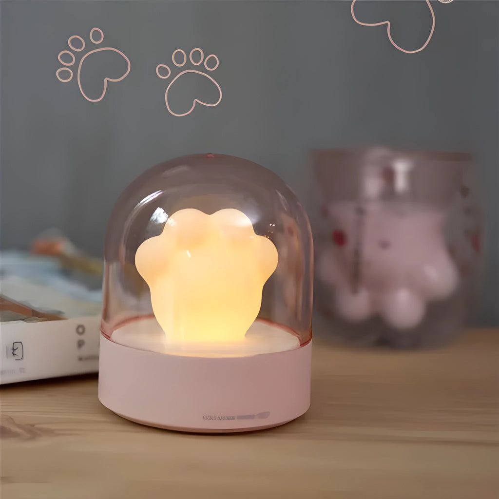 Grey cat paw shaped night light with USB charging cable and adjustable brightness controls
