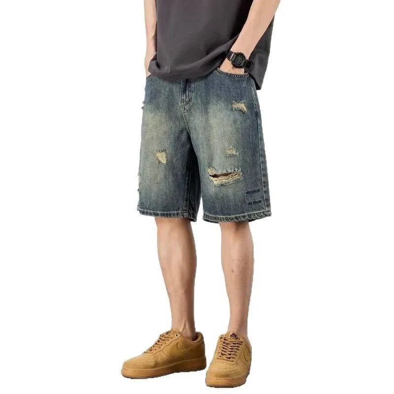 Blue men's denim shorts with a retro loose hole distressed design and a straight-leg cut